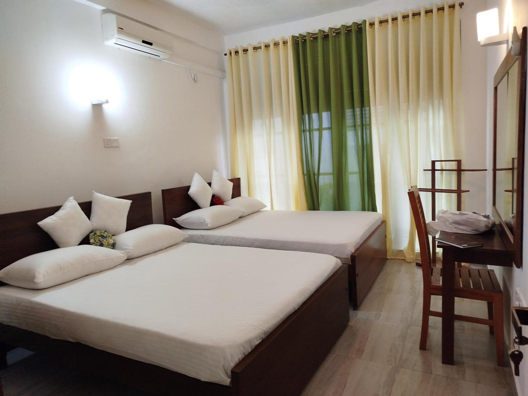 Elzangi Hotel Negombo Quarto foto